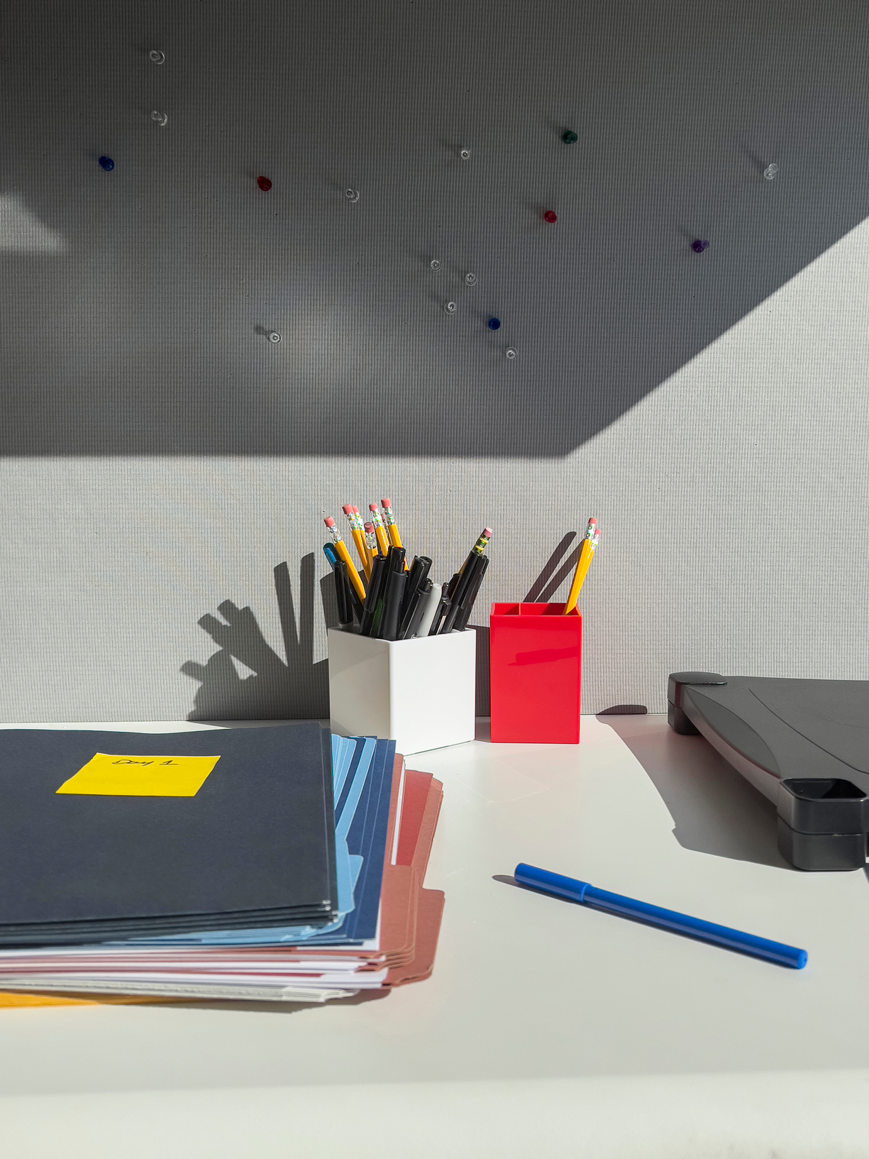 A person working through notes and messages with support